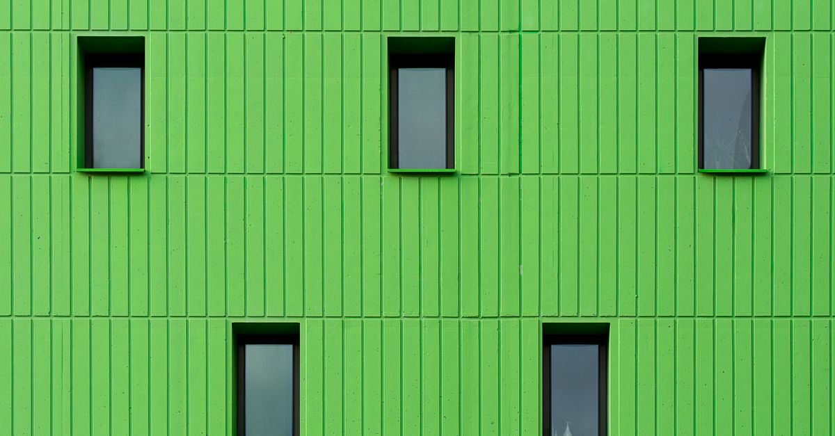 Green Building Windows A Green Building with Windows · Free Stock Photo