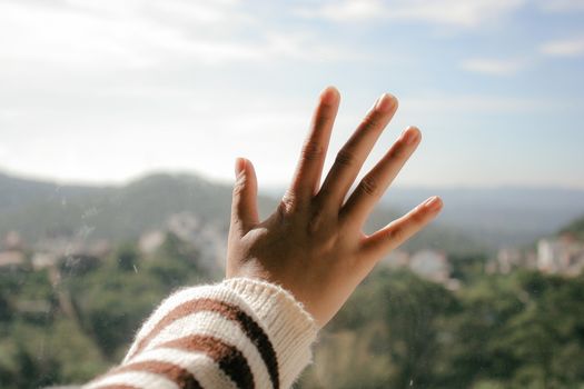 Close-Up Photo of Hand on Glass