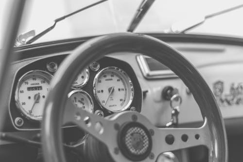 Free Grey and Black Car Steering Wheel Stock Photo