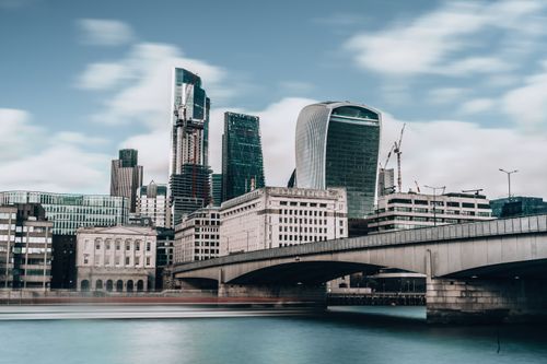 Free Stunning view of London's modern skyline with iconic skyscrapers and the river Thames. Stock Photo