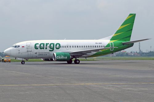 Free Citilink cargo airplane on a tarmac at an airport under an overcast sky. Stock Photo