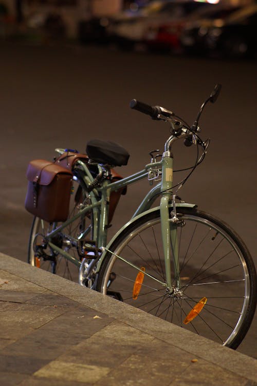 A Bicycle Parked Near the Road 