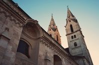 Low Angle Photography of Beige Concrete Church