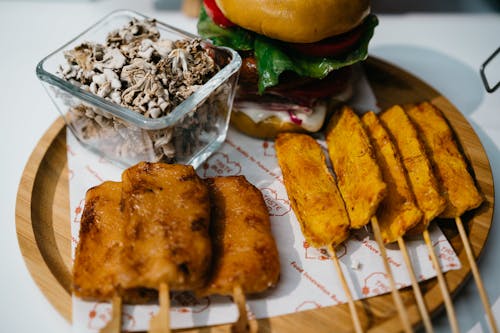 Foods on Brown Wooden Round Plate