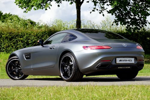 Free Gray Mercedes-benz Amg Coupe Parked Near Tree Stock Photo