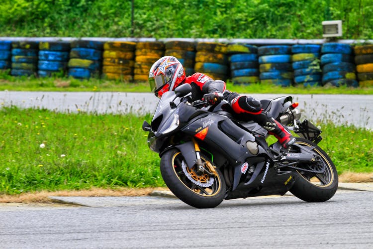 Rider On Motorcycle On Circuit