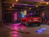Red Chevrolet Camaro on Road during Nighttime