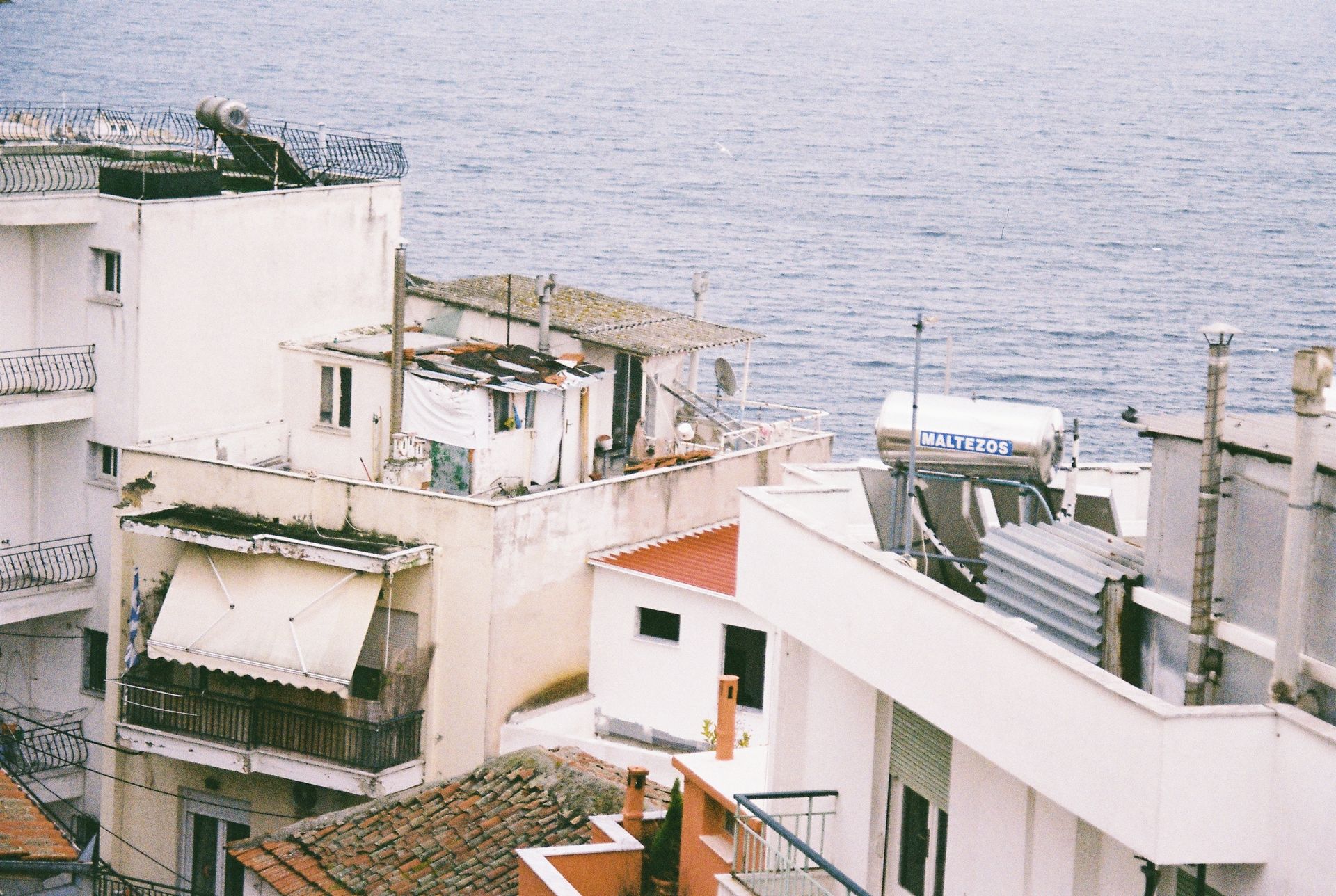 Aerial view of Kavala's urban landscape with sea backdrop. Greece.