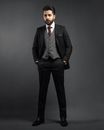 Man in Black Suit Standing