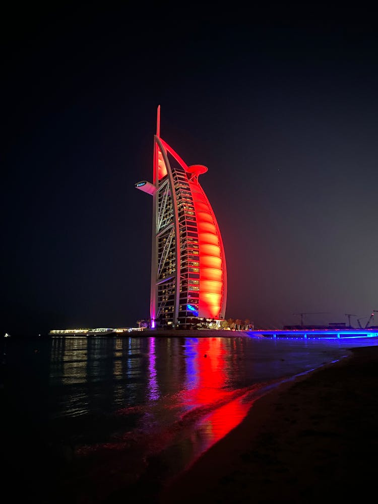 A Burj Al Arab With Lights At Night