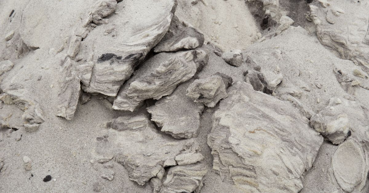 Close-up of folded rock layers on Mount Adaklu showing quartzite and schist
