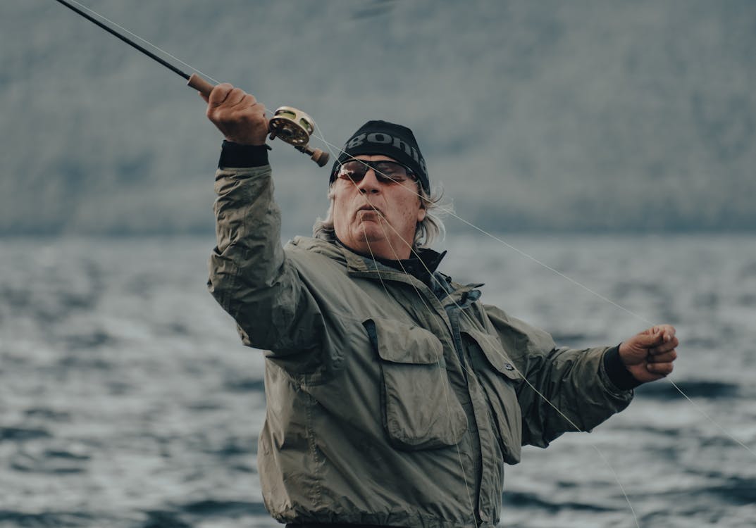 A Man Casting His Fishing Line · Free Stock Photo