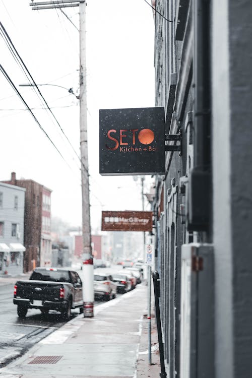 Street View with Cars and Bar Sign