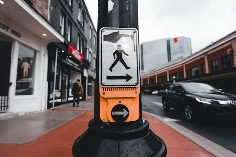 Sign On Pole On Street