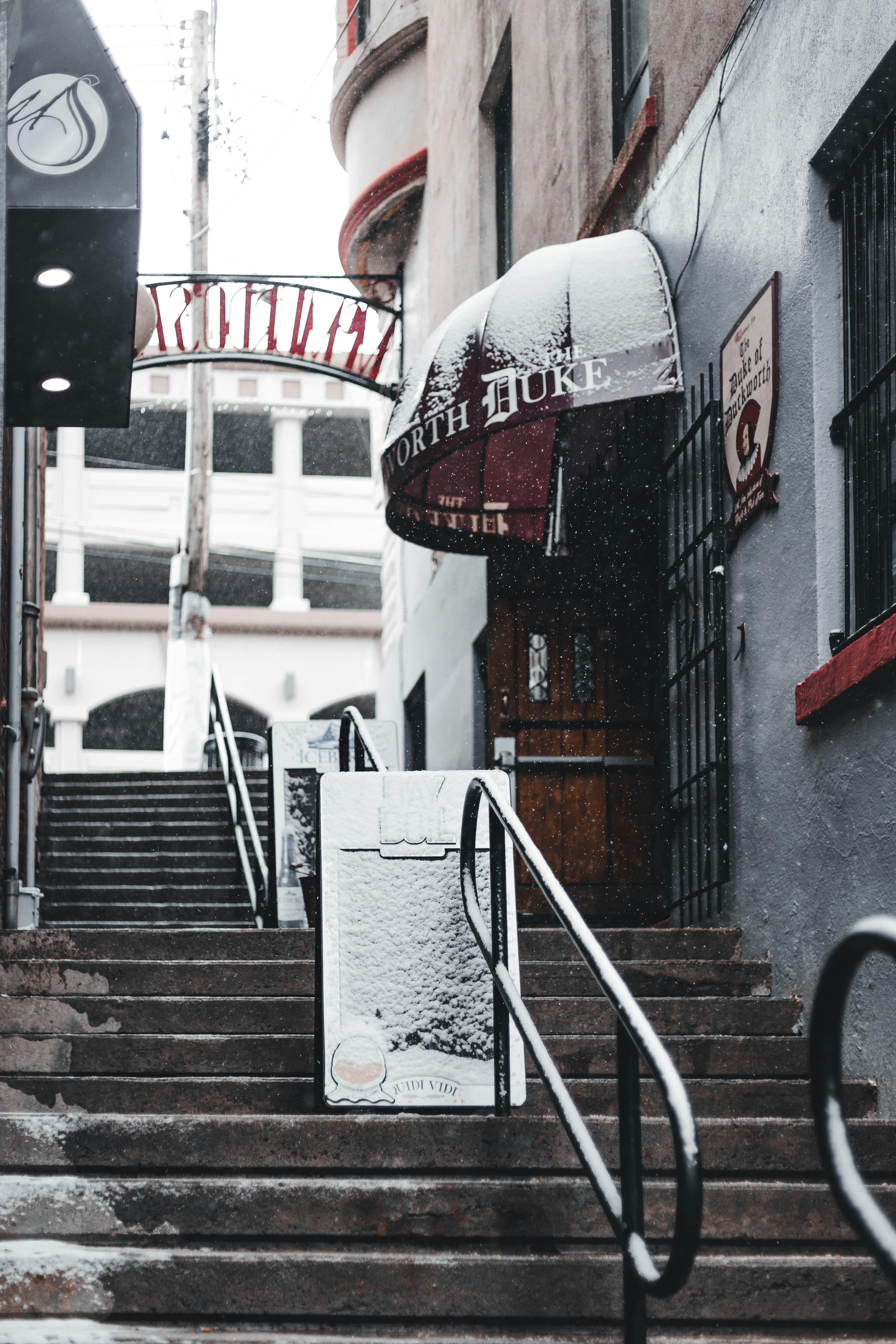 Alley with Concrete Steps and Stainless Steel Railings · Free Stock Photo