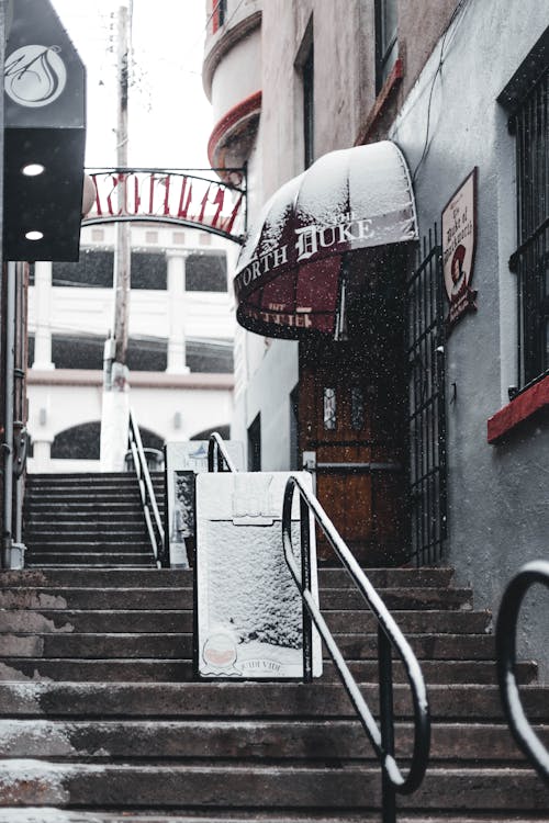 Alley with Concrete Steps and Stainless Steel Railings · Free Stock Photo