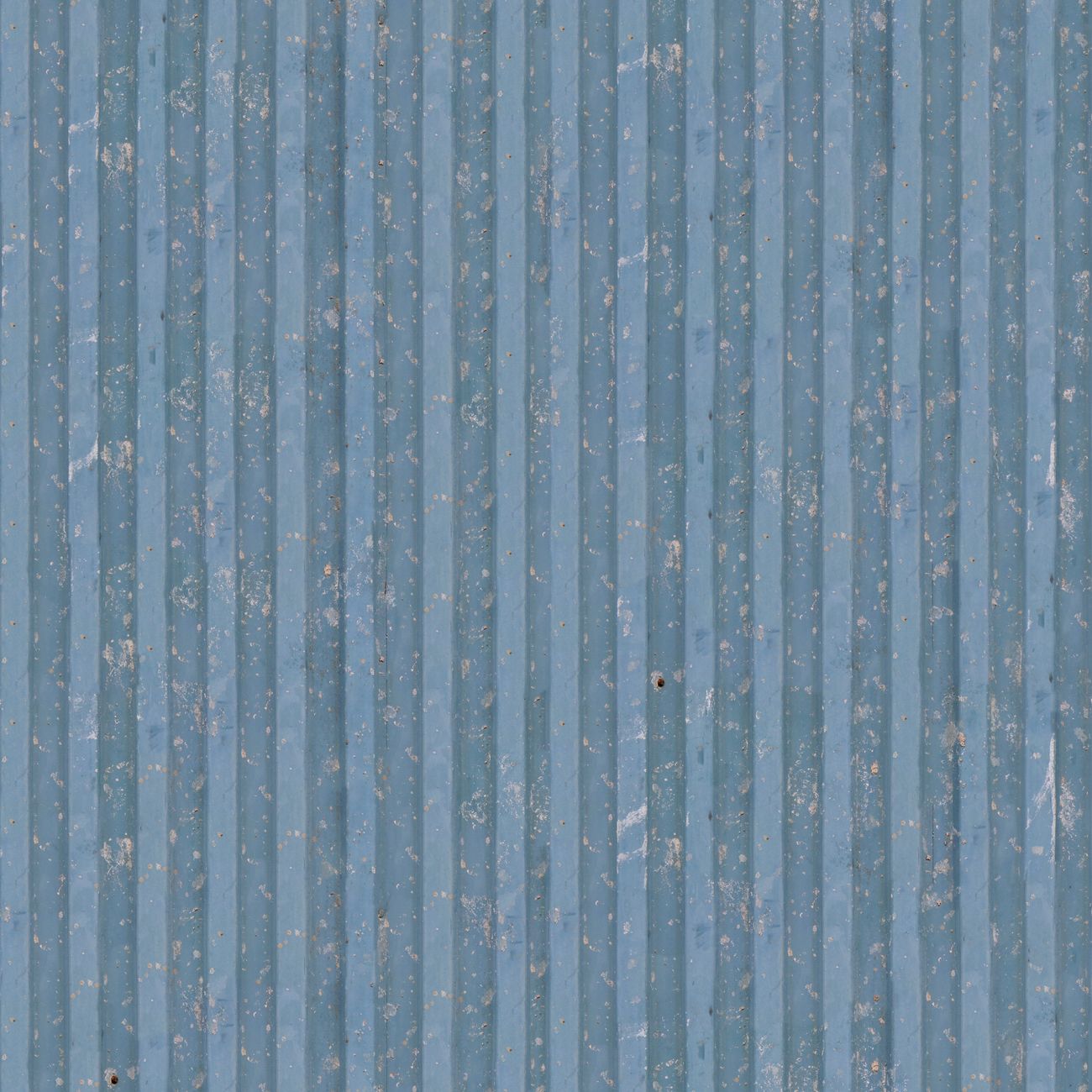 Close-up of a blue corrugated metal surface with weathered texture.