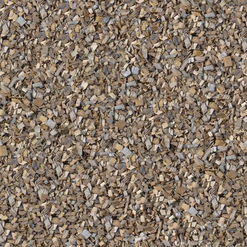 Free Detailed view of mixed wood chips creating an organic texture perfect as a background. Stock Photo