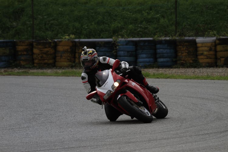 Man Riding Motorcycle On Circuit