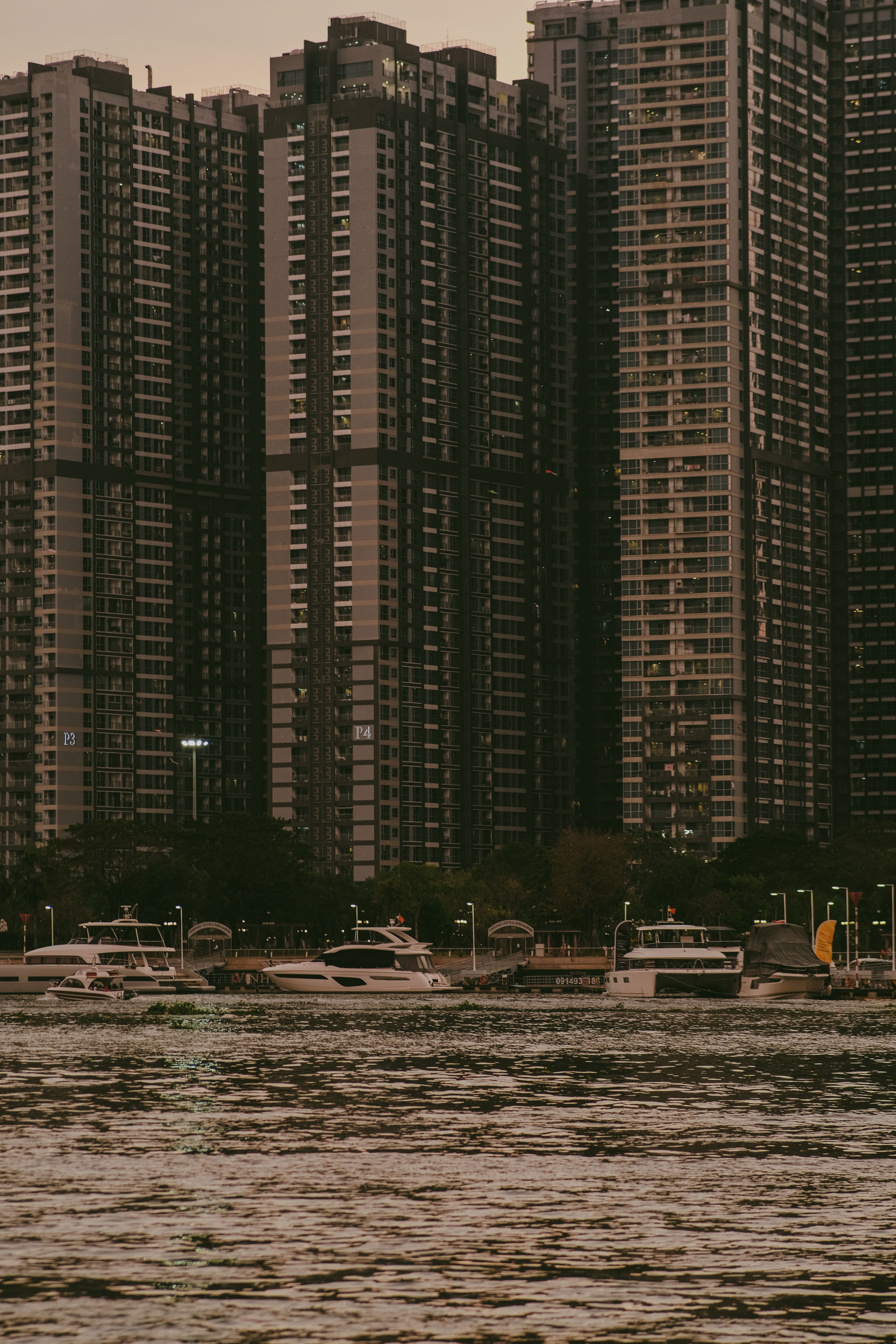 White Boats on Water Near High Rise Building · Free Stock Photo