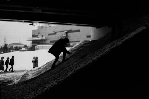 Grayscale Photo of a Person's Silhouette