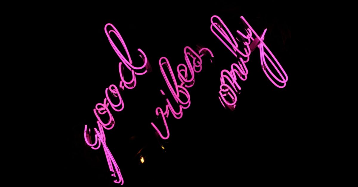 Pink Sign Background Pink Neon Light Signage on a Black Background · Free Stock Photo