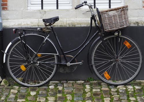 Photograph of a Black Bicycle with a Basket