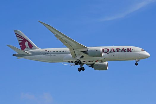 White and Red Airplane in Mid Air