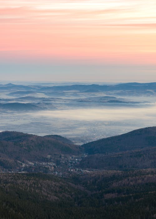 Foggy Mountains During Sunset