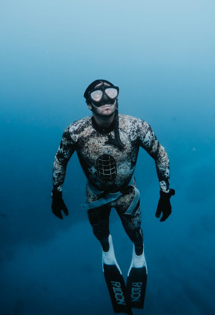 Man In Drysuit Underwater