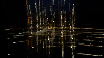 Abstract photograph of blurred light trails against a dark background, — Photo by Ludvig Hedenborg on Pexels