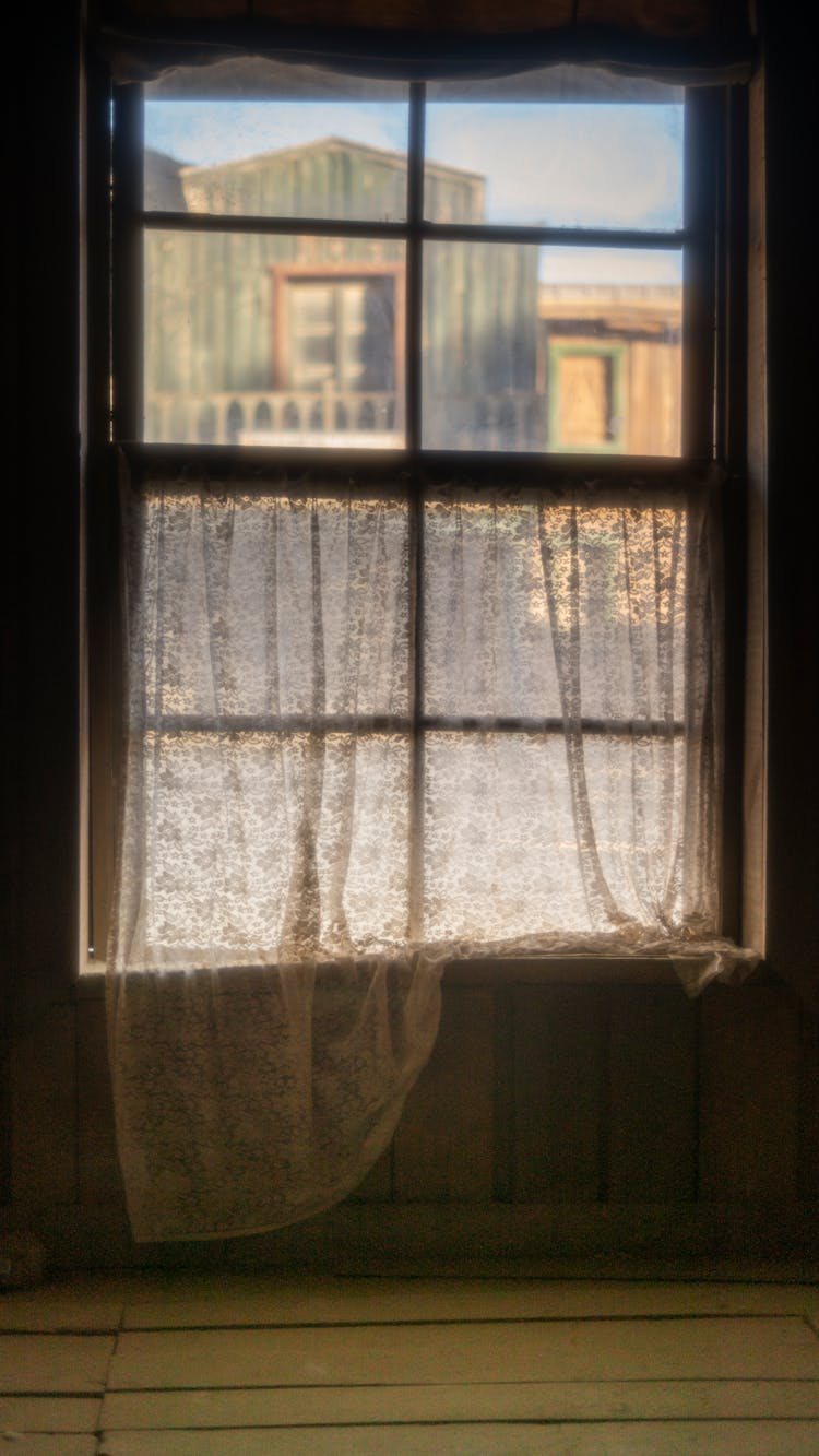 Window With A Sheer Curtain