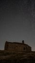 Brown Concrete Building Under Blue Sky during Night Time