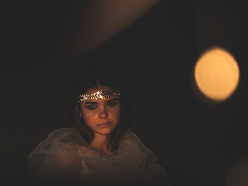 Beautiful Woman Wearing a Headpiece