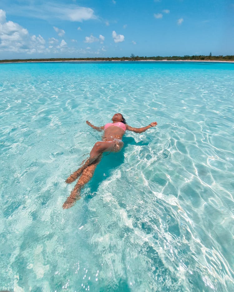 Woman Floating On Water