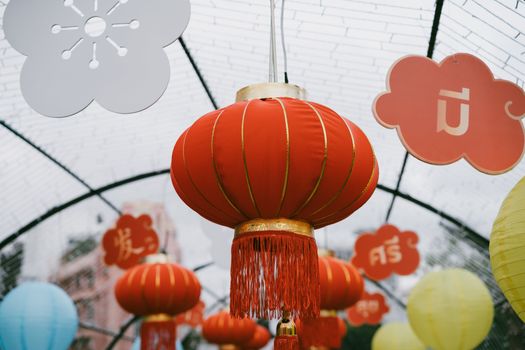 Close-up of red Chinese lanterns hanging as festival decorations.