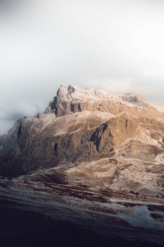Capture of a dramatic rocky mountain range at dawn, showcasing the beauty of outdoor nature.