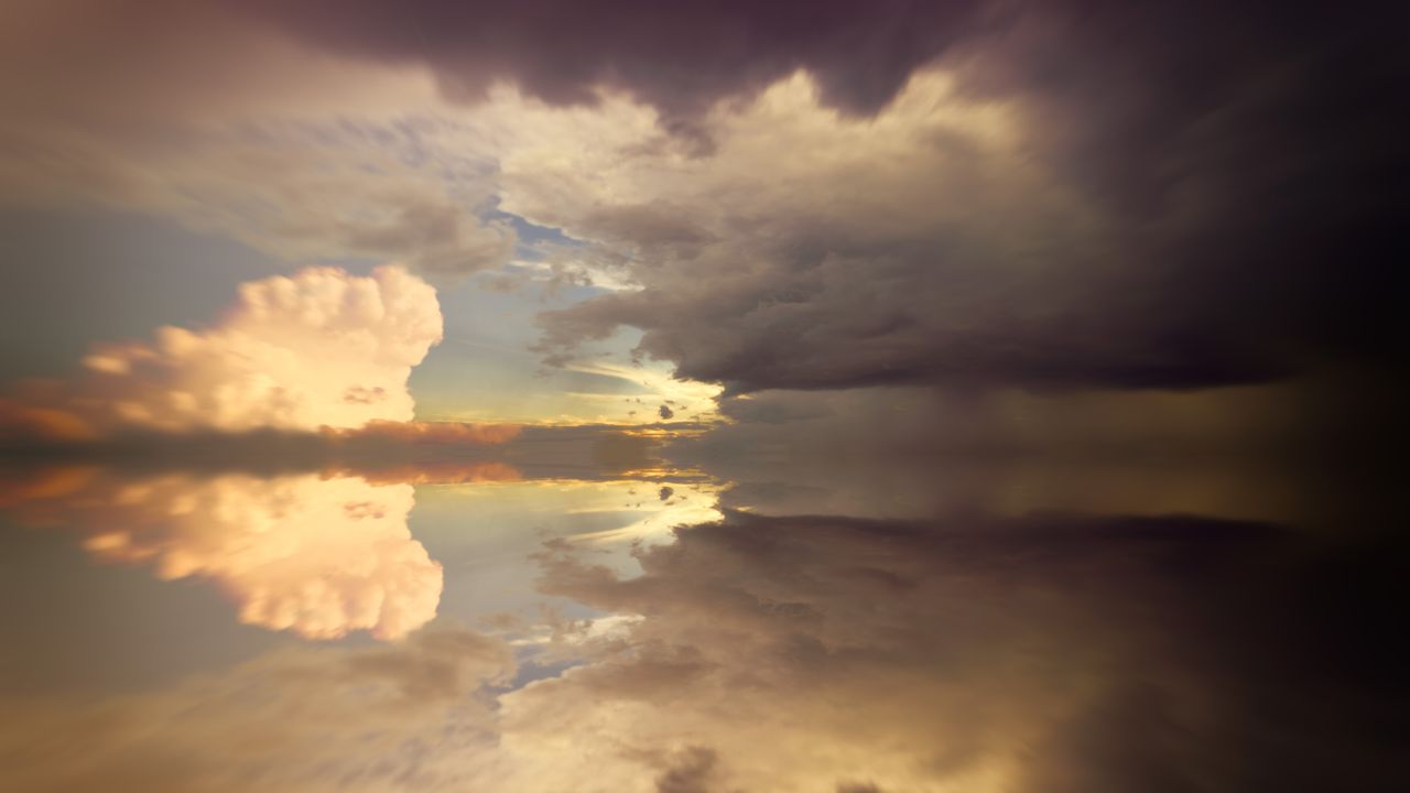 stunning dramatic cloud reflections on ocean water during dusk showcas