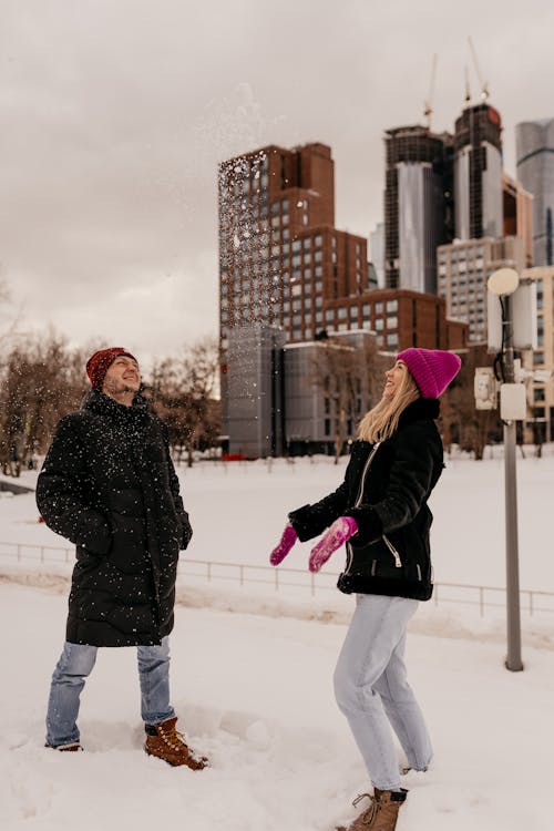 A Couple Playing with Snow