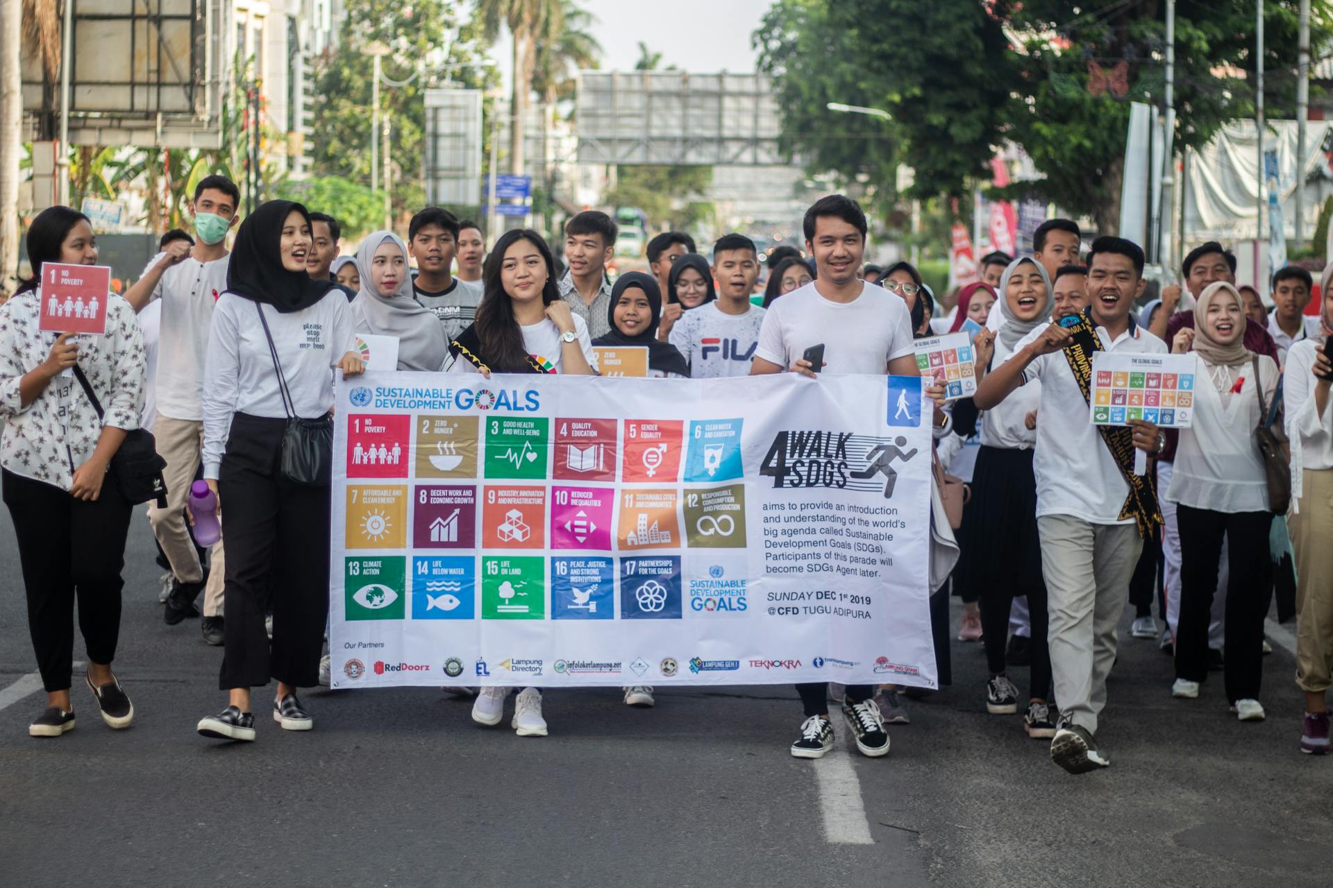 A dynamic youth parade promoting Sustainable Development Goals in Bandar Lampung, Indonesia.