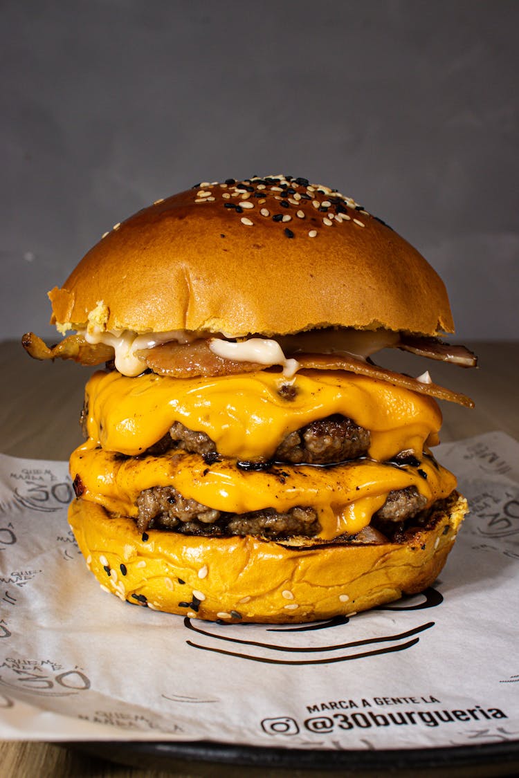 Burger With Cheese On Paper