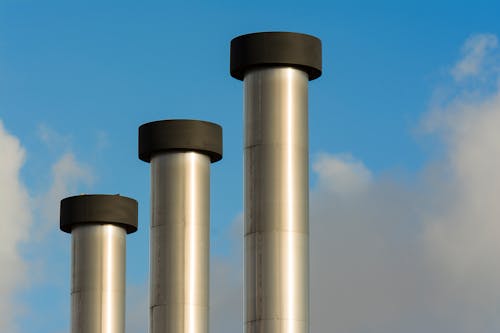 Steel Pipes Against the Sky