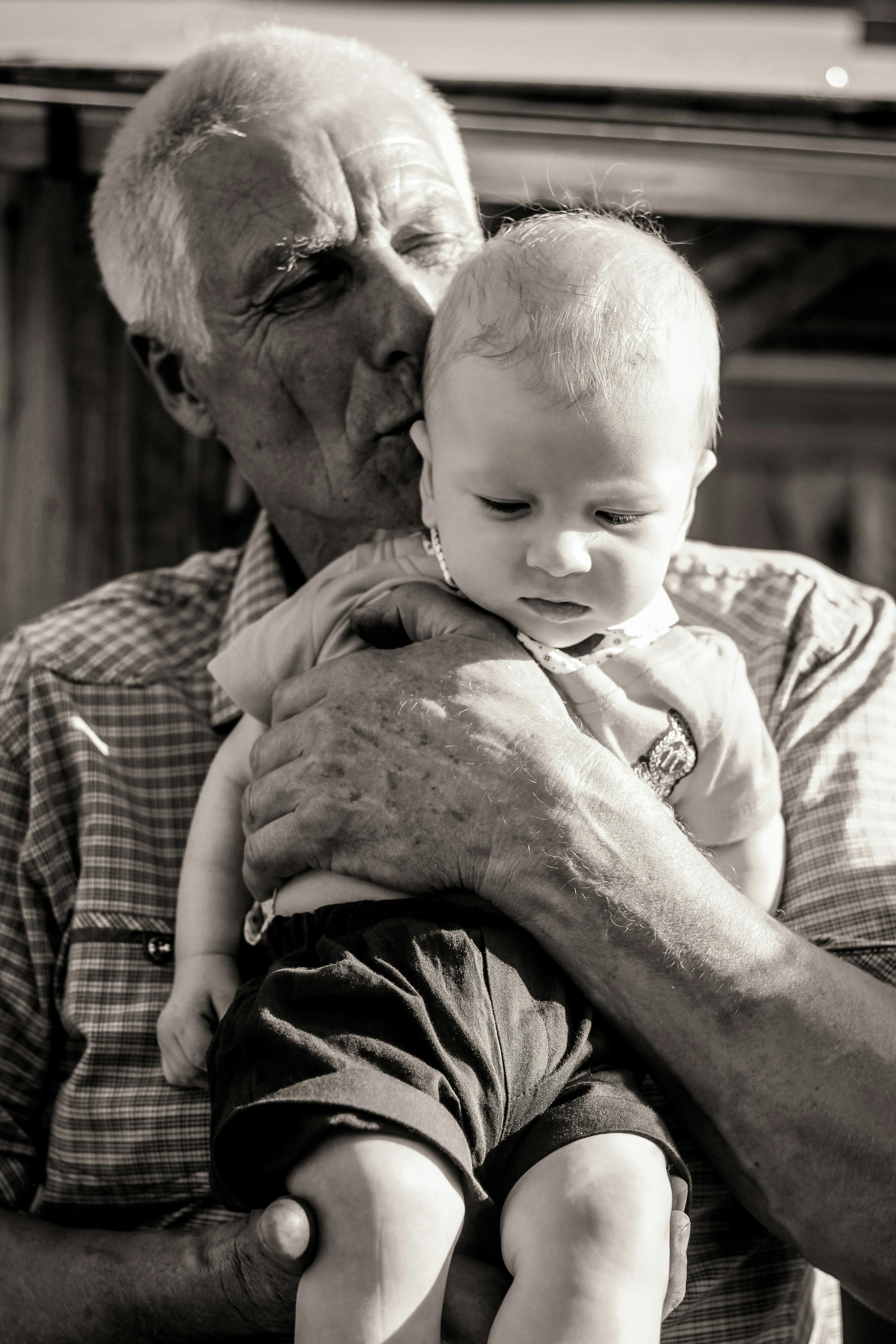 Teenager Playing Chess with his Grandfather · Free Stock Photo