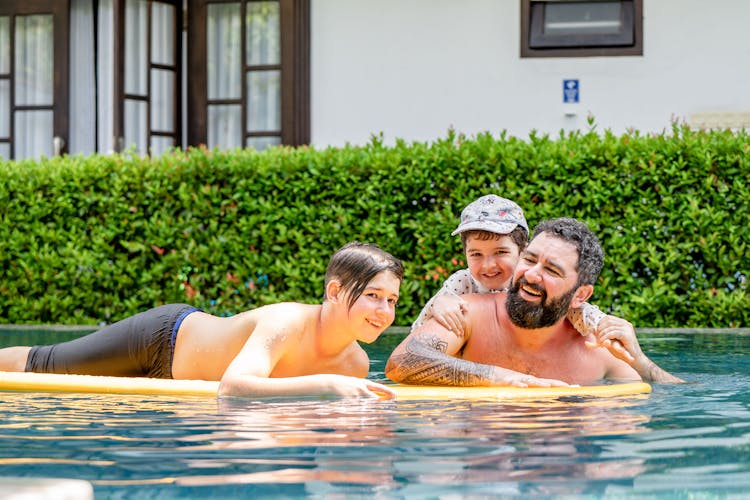 Happy Family In The Pool
