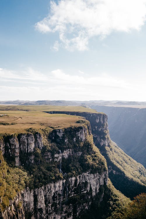 Aerial Photography of Mountains under the Cloudy Sky