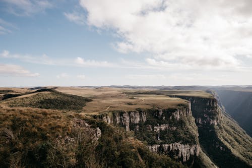 Aerial Photography of Mountains under the Cloudy Sky