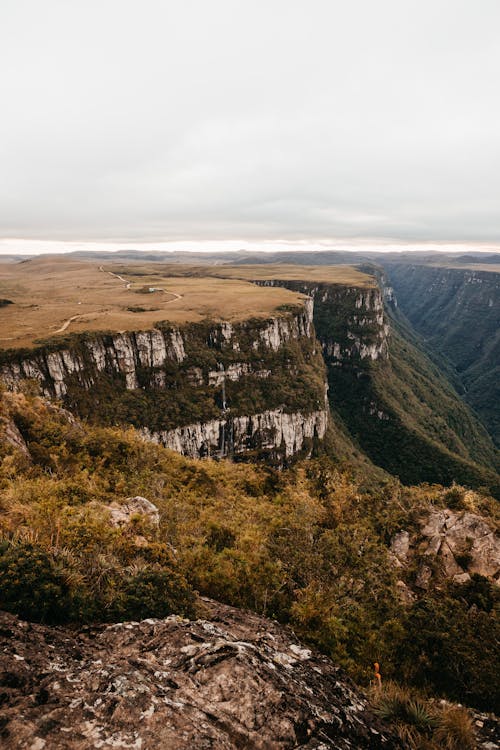 Aerial Photography of Mountains under the Cloudy Sky