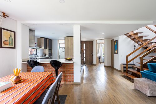Free Bright and spacious open-plan kitchen and dining area with modern decor in Chía, Colombia. Stock Photo