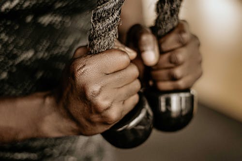 Close-up on Hands of Person Working Out