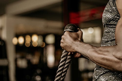 Free Person Holding Battle Ropes Stock Photo